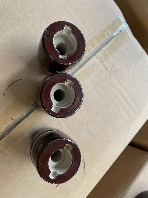 1kV 200A चीनी मिट्टी के बरतन OEM ड्रा लीड ट्रांसफार्मर बुशिंग ब्राउन ग्लेज़ेड